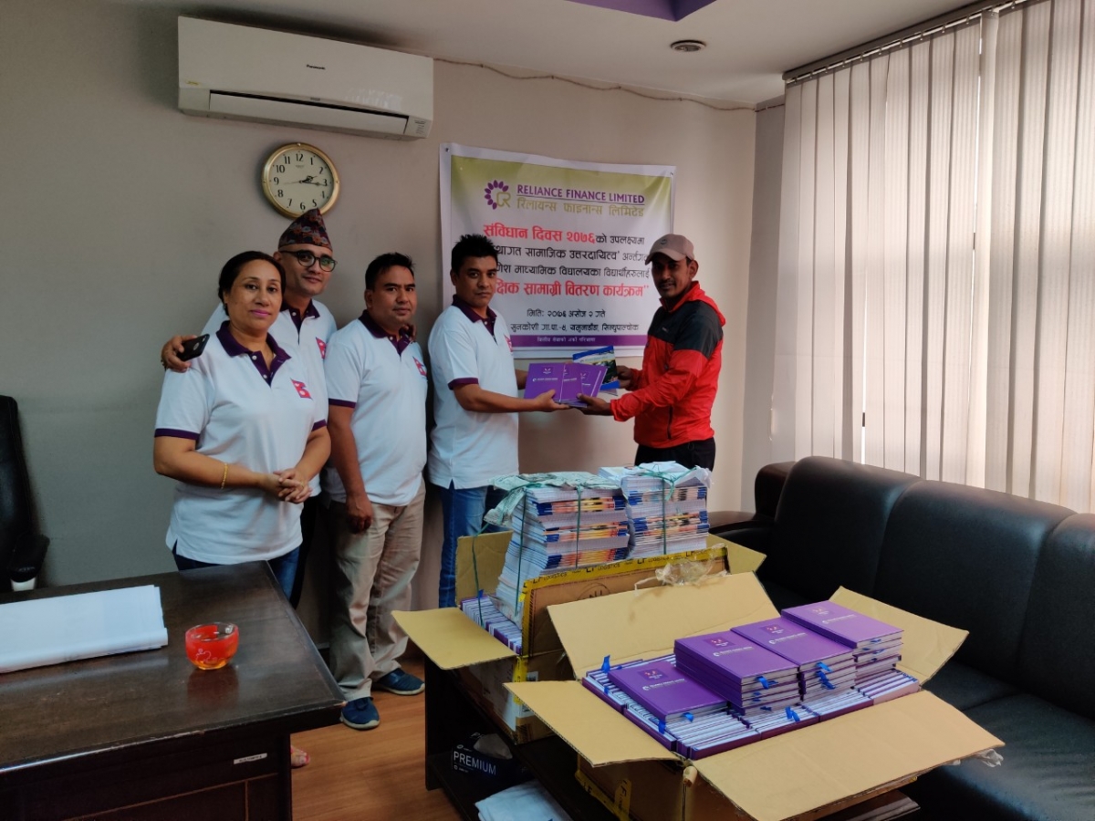 Distribution of educational materials to the students of Shree Ganesh Secondary School