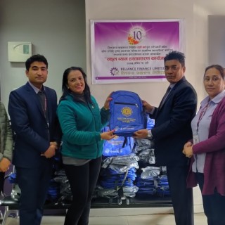 Reliance Finance Limited in collaboration with Lions Club International organized the school bag handover program